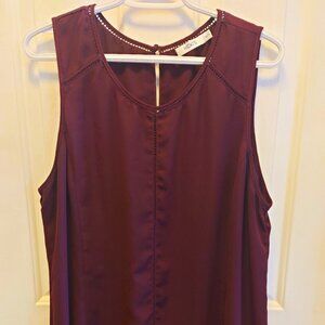 Ricki's maroon top